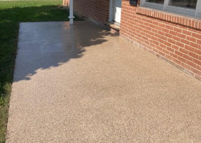 Image of the front sidewalk after the epoxy is added