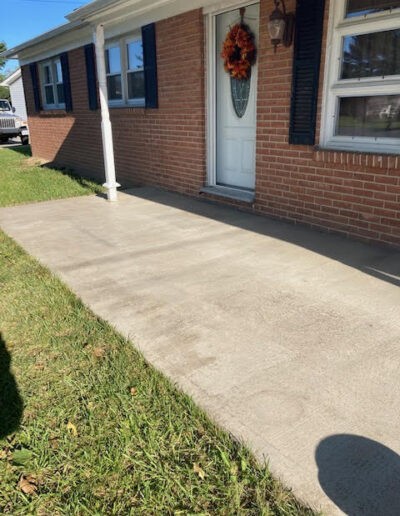 Image of the front sidewalk before work is done